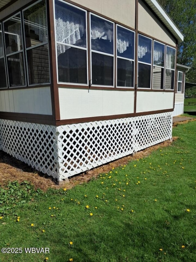 140 Bittners Park Rd, Trout Run, PA 17771 - view of side of property featuring a sunroom and a lawn