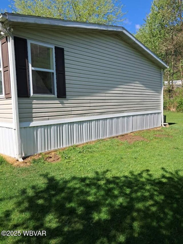 140 Bittners Park Rd, Trout Run, PA 17771 - view of side of home featuring a yard