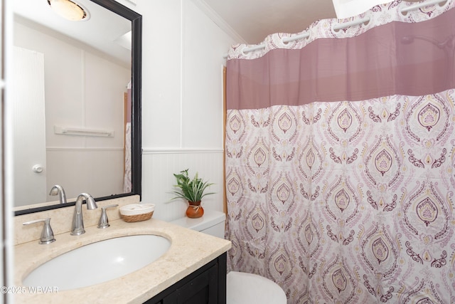 140 Bittners Park Rd, Trout Run, PA 17771 - bathroom featuring vanity, toilet, a shower with curtain, and a wainscoted wall