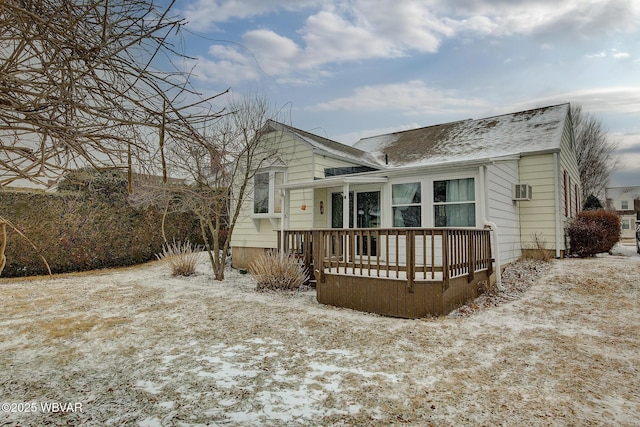 view of snow covered house