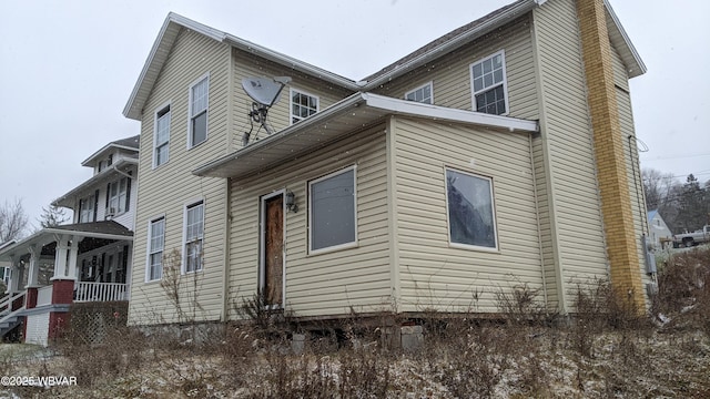 view of home's exterior featuring covered porch