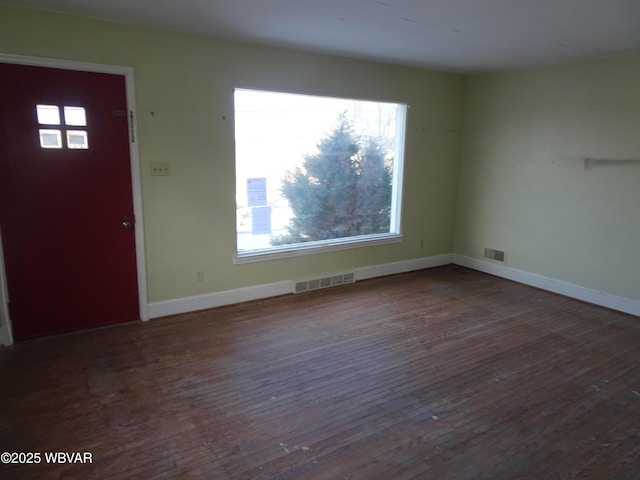 entrance foyer featuring dark hardwood / wood-style flooring