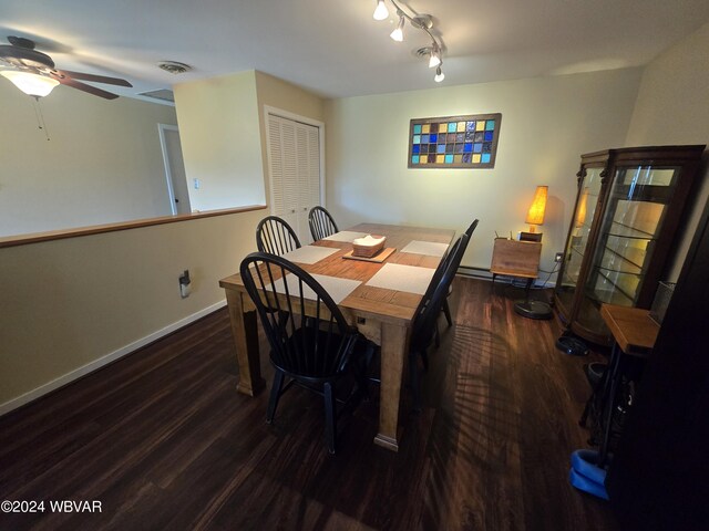 dining room featuring ceiling fan and dark wood-type flooring