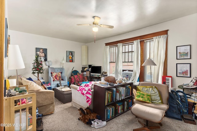 living room with carpet floors and ceiling fan