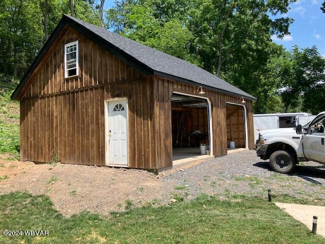 exterior space featuring an outbuilding