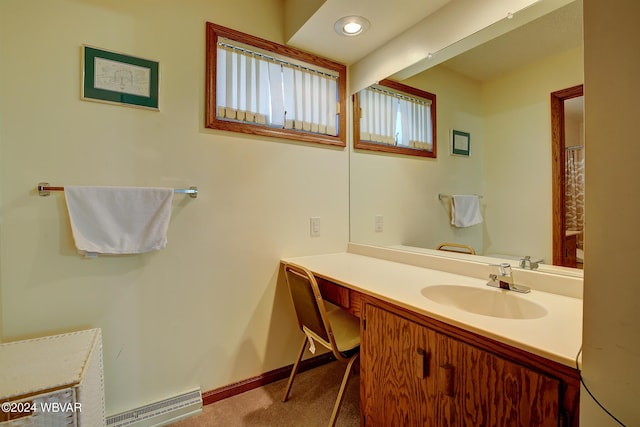 bathroom featuring vanity and a baseboard radiator