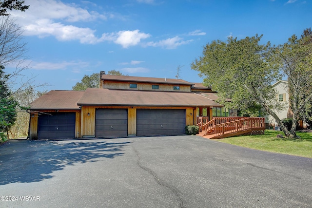 view of front of house featuring a wooden deck