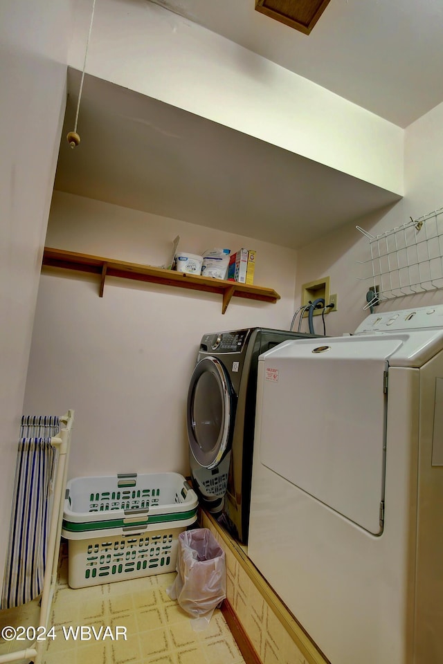 laundry area with washer and clothes dryer