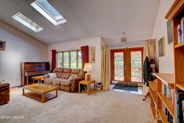 living room with french doors, carpet floors, vaulted ceiling, and a healthy amount of sunlight