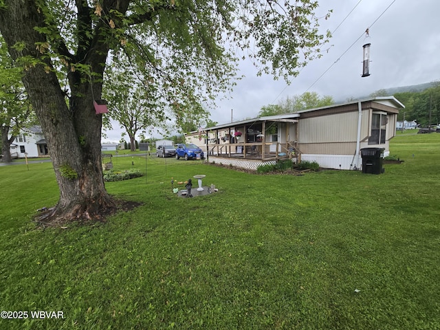 446 State St, Jersey Shore, PA 17740 - view of green lawn with a wooden deck