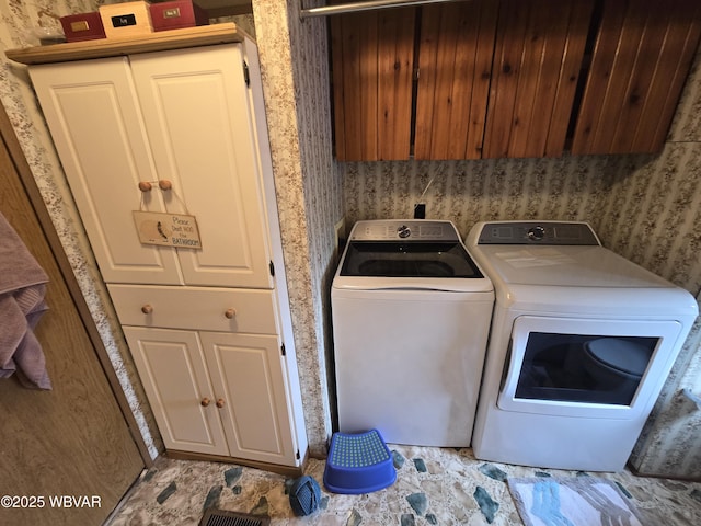 446 State St, Jersey Shore, PA 17740 - washroom with washing machine and dryer, cabinet space, and wallpapered walls