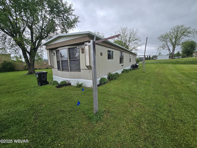 446 State St, Jersey Shore, PA 17740 - view of home's exterior with a yard