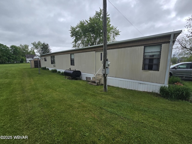 446 State St, Jersey Shore, PA 17740 - back of property with heating fuel, a lawn, and entry steps
