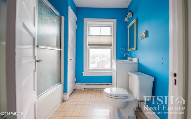 full bathroom featuring vanity, toilet, enclosed tub / shower combo, and baseboard heating