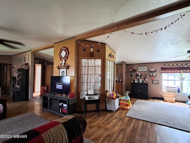 442 Mcelhattan Dr, Lock Haven, PA 17745 - living area featuring wood finished floors, a textured ceiling, cooling unit, and a ceiling fan