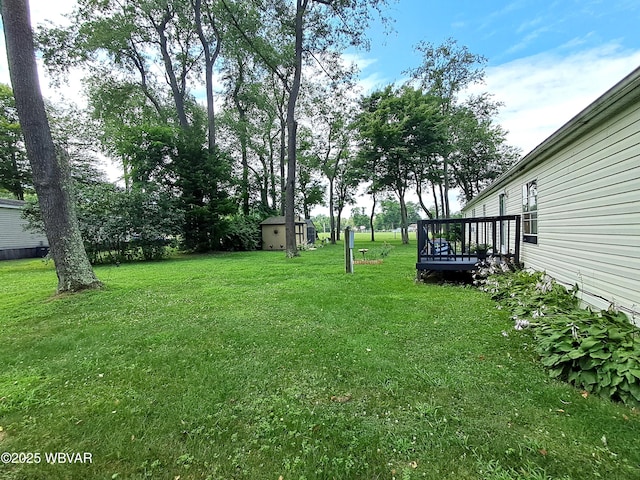 442 Mcelhattan Dr, Lock Haven, PA 17745 - view of grassy yard with a shed and a deck