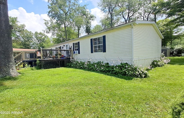 442 Mcelhattan Dr, Lock Haven, PA 17745 - view of home's exterior featuring a wooden deck and a lawn