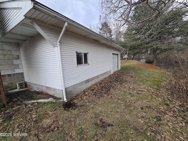 view of property exterior with a garage