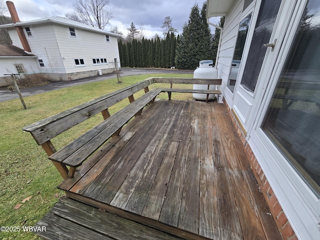 deck featuring a lawn