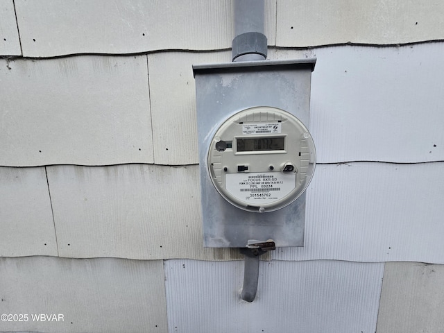 exterior details featuring electric meter