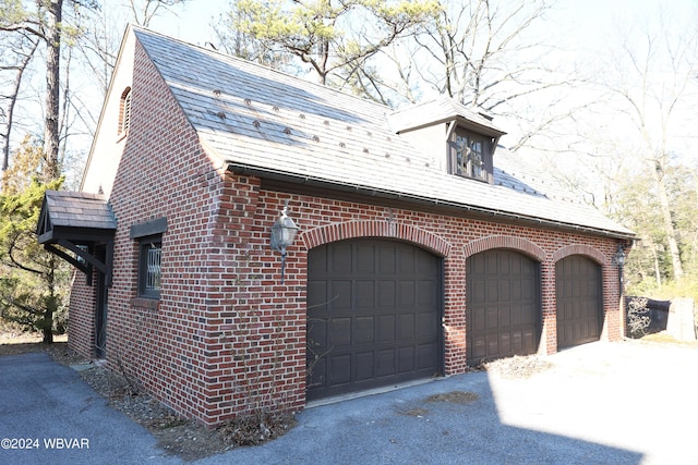 exterior space with a garage