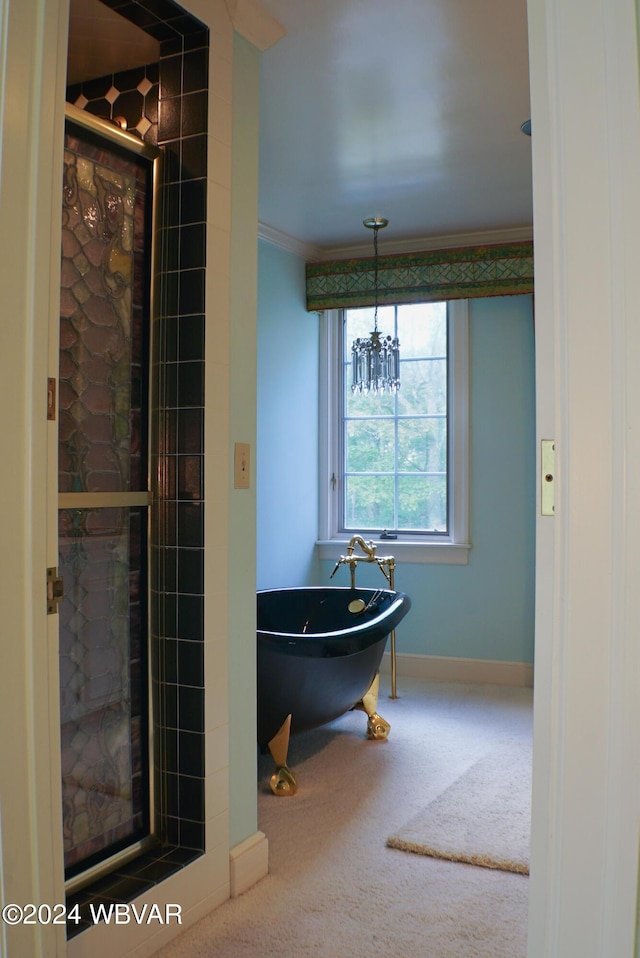 bathroom featuring separate shower and tub and ornamental molding