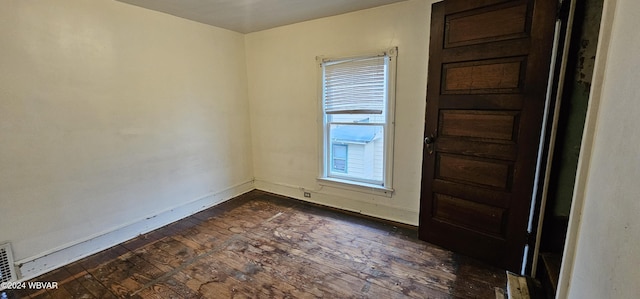 foyer with dark hardwood / wood-style flooring