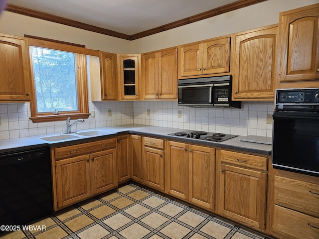 kitchen featuring backsplash, sink, black appliances, and ornamental molding