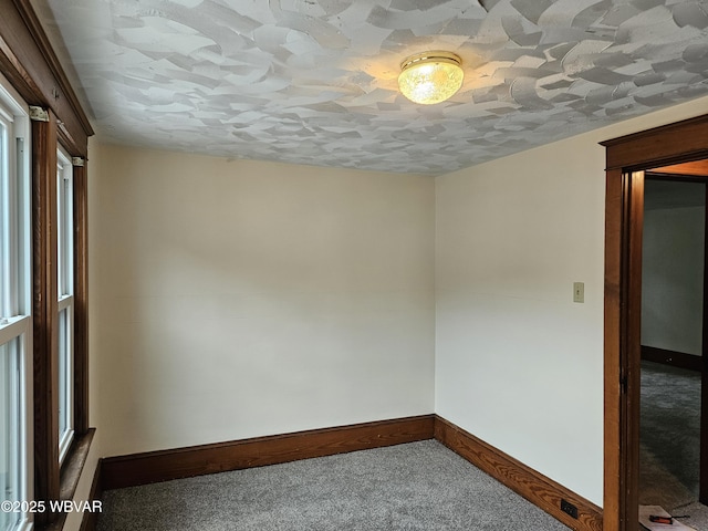 spare room with carpet flooring