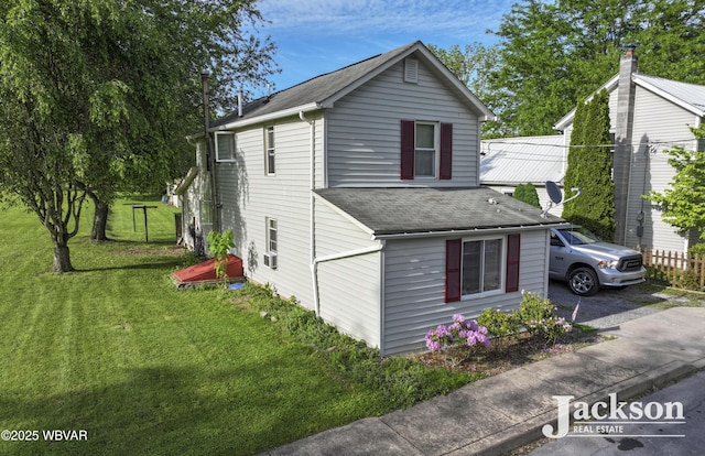 232 Nelson St, Jersey Shore, PA 17740 - view of front of home with roof with shingles and a front lawn