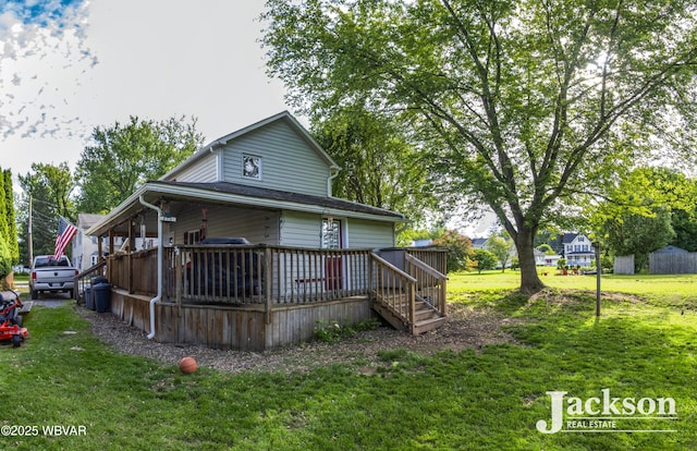 232 Nelson St, Jersey Shore, PA 17740 - view of front of home with a front lawn and a deck