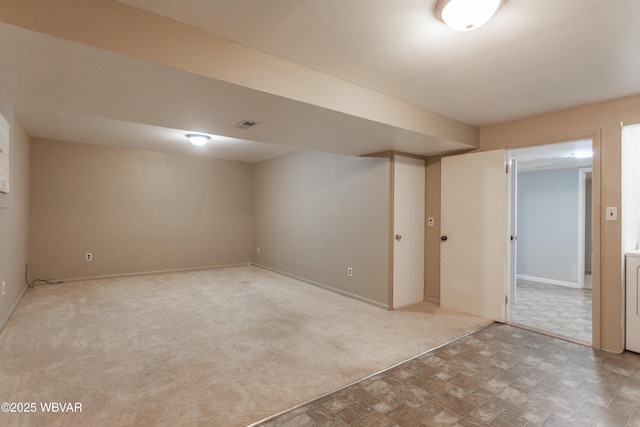 basement with light carpet