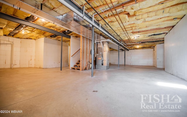 basement featuring heating unit