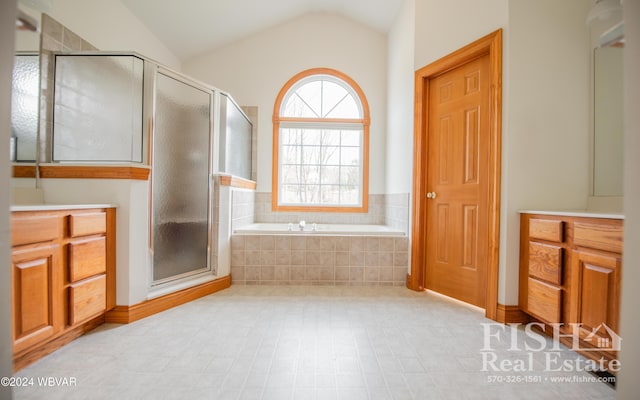 bathroom featuring vanity, lofted ceiling, and shower with separate bathtub