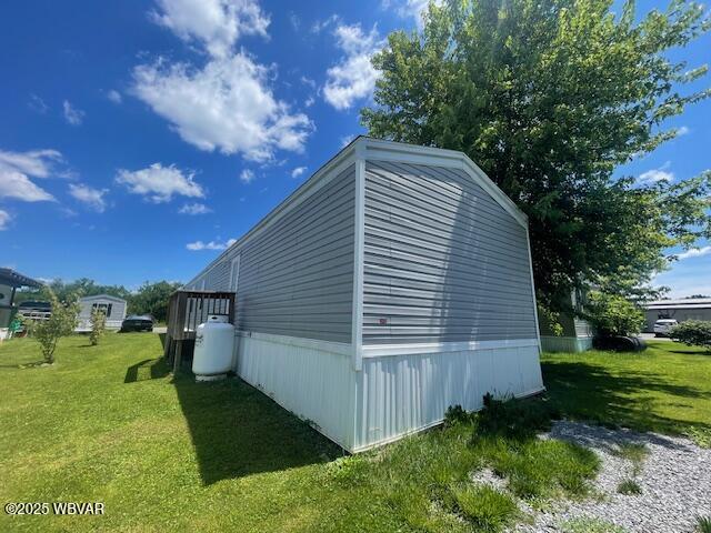 14 Albatross Dr, Watsontown, PA 17777 - view of home's exterior featuring a lawn