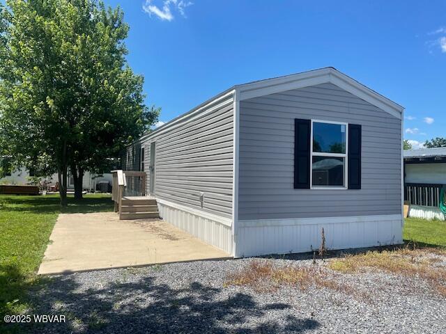 14 Albatross Dr, Watsontown, PA 17777 - view of property exterior with a patio