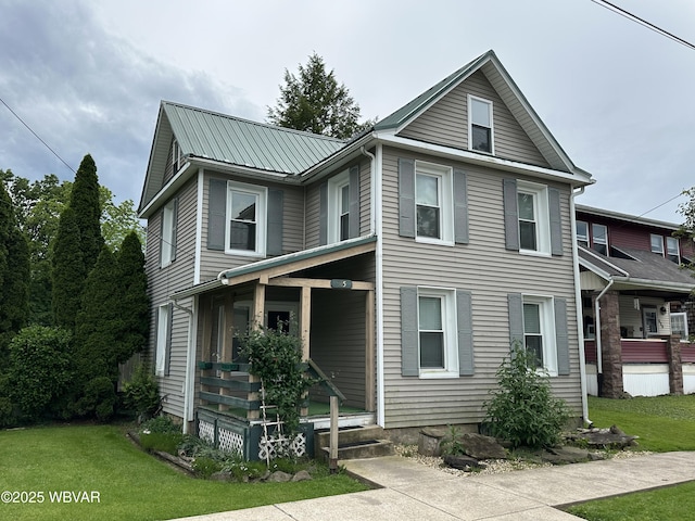 325 Washington Ave, Jersey Shore, PA 17740 - view of front of house with a front yard, a porch, and metal roof