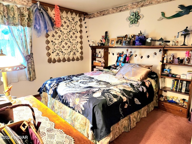 bedroom featuring carpet