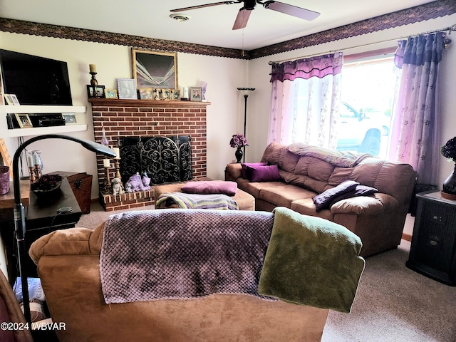 living room with carpet, ceiling fan, and a fireplace