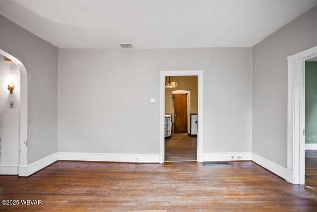 152 Carpenter St, Dushore, PA 18614 - unfurnished room featuring wood finished floors and arched walkways