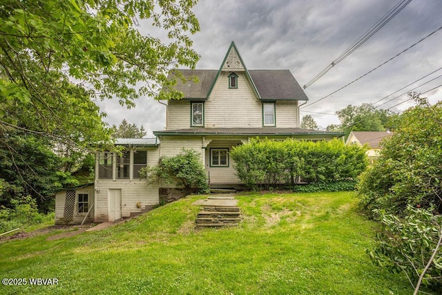 152 Carpenter St, Dushore, PA 18614 - rear view of house featuring a yard