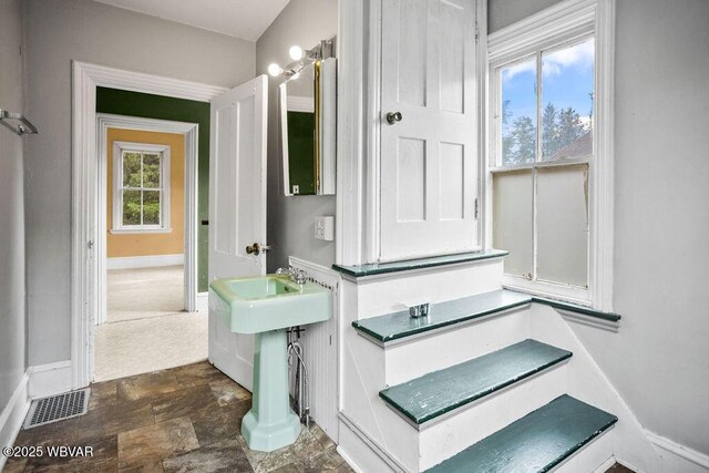 152 Carpenter St, Dushore, PA 18614 - bathroom with baseboards and stone finish flooring