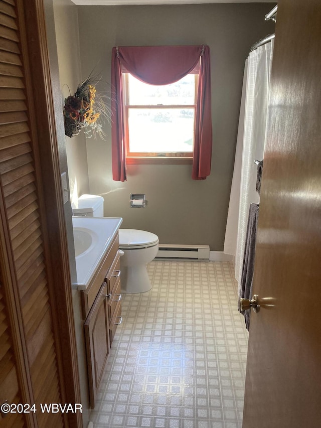 full bathroom with curtained shower, a baseboard radiator, toilet, vanity, and tile patterned floors