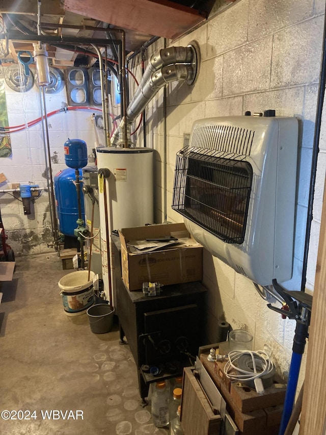 utility room with gas water heater