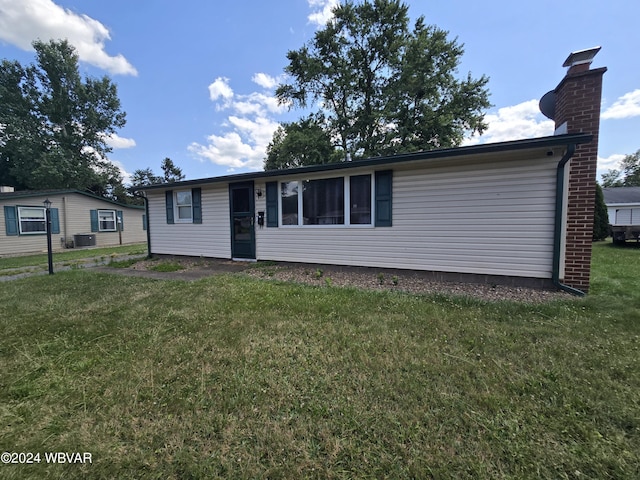 view of front of home with a front yard