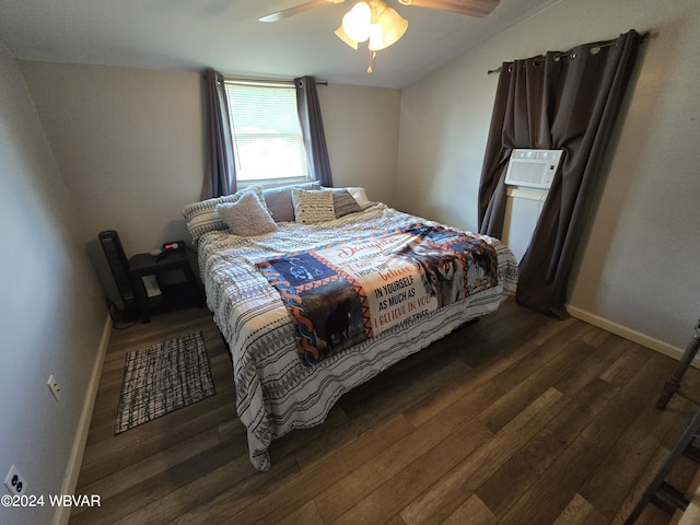 bedroom featuring ceiling fan, cooling unit, dark wood-type flooring, and vaulted ceiling