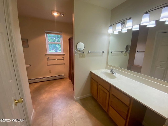 29 S Parsons Dr, Mill Hall, PA 17751 - bathroom featuring baseboard heating, vanity, and tile patterned floors