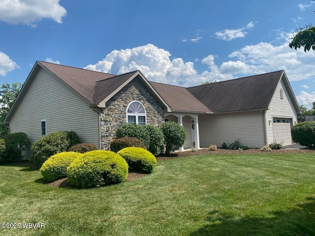 29 S Parsons Dr, Mill Hall, PA 17751 - view of front of house with an attached garage, a front lawn, roof with shingles, and stone siding