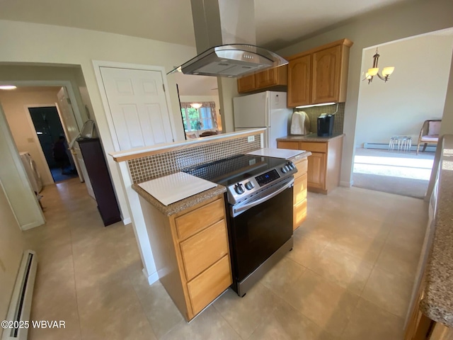 29 S Parsons Dr, Mill Hall, PA 17751 - kitchen featuring island exhaust hood, stainless steel electric range, freestanding refrigerator, baseboard heating, and decorative backsplash