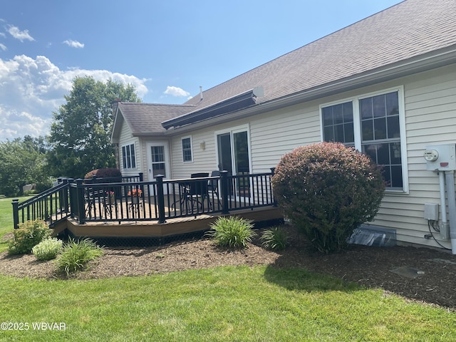 29 S Parsons Dr, Mill Hall, PA 17751 - rear view of house featuring a lawn, a wooden deck, and a shingled roof